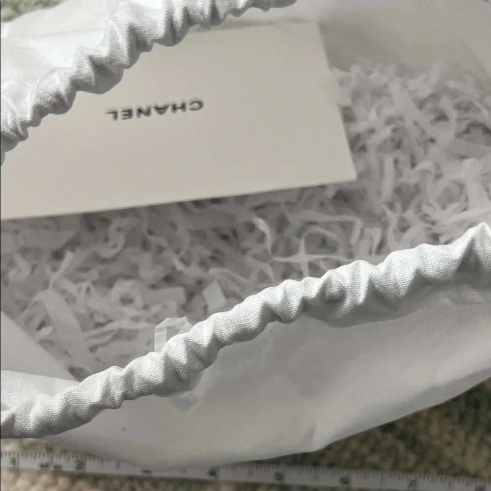 CHANEL White Pouch with Black Logo